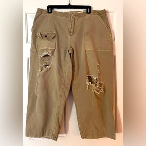 Pilcro low rise distressed trousers.